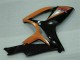 Plástico Suzuki GSXR 600 / 750 K6 2006-2007 - Preto Laranja Plástico Suzuki GSXR 600 / 750 K6 2006-2007 - Preto Laranja